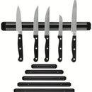 Suporte magnético de parede organizando facas, utensílios de cozinha e ferramentas metálicas de forma prática e segura.